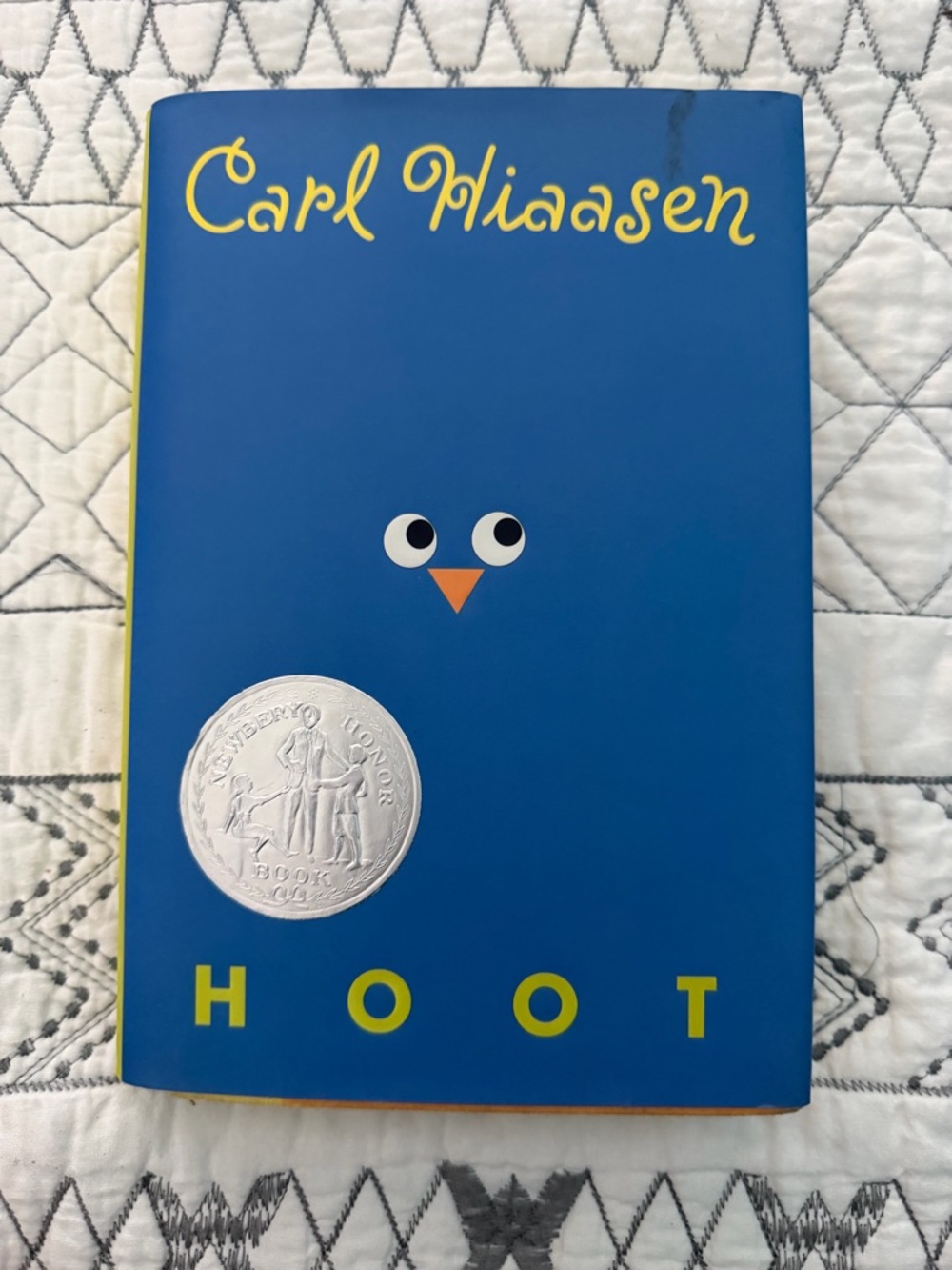 Hoot by Carl Hiaasen - Blue Cover with Yellow Title